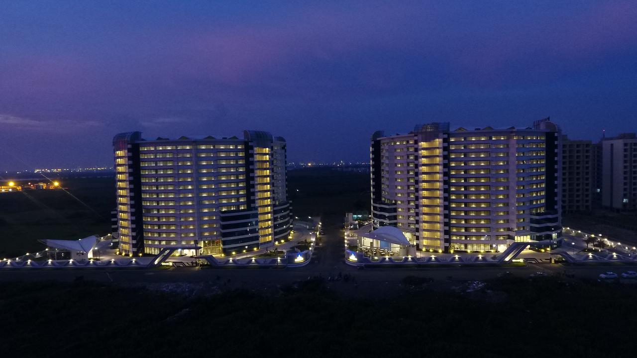 Rajhans Belliza Service Apartment Сурат Экстерьер фото