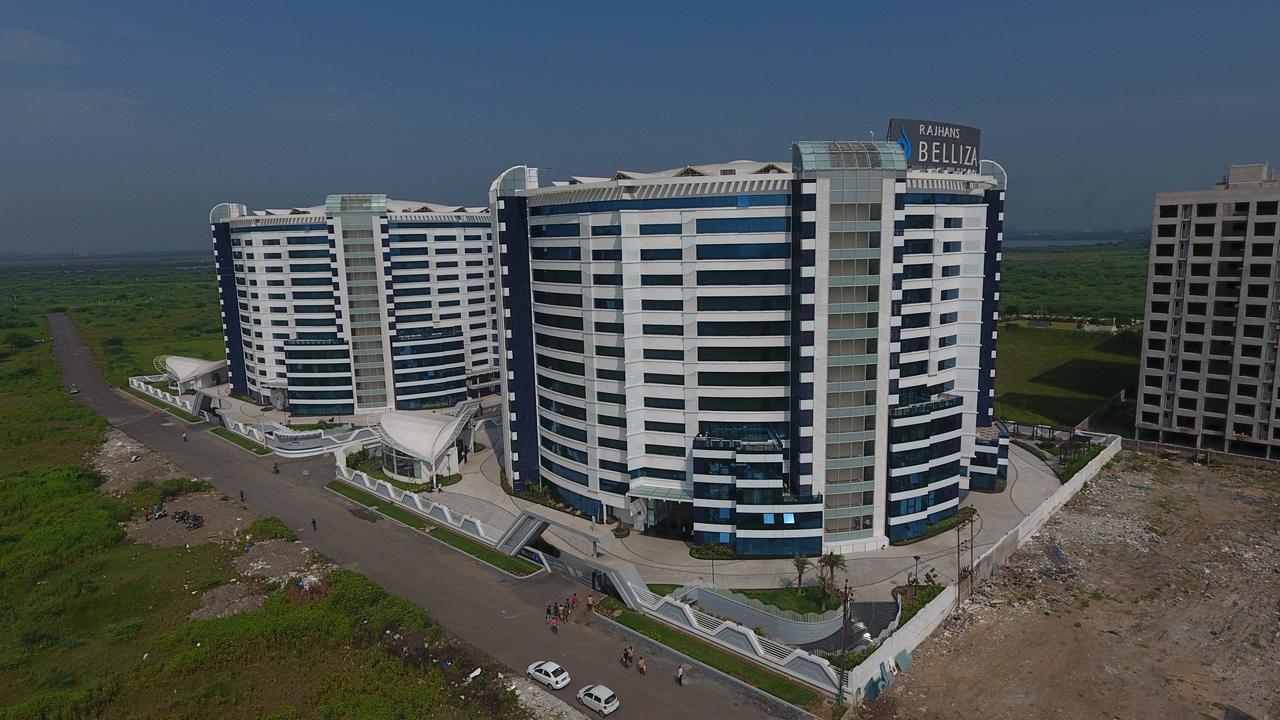 Rajhans Belliza Service Apartment Сурат Экстерьер фото