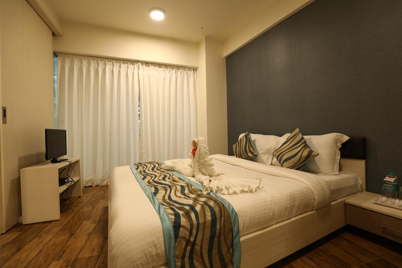 Rajhans Belliza Service Apartment Сурат Экстерьер фото