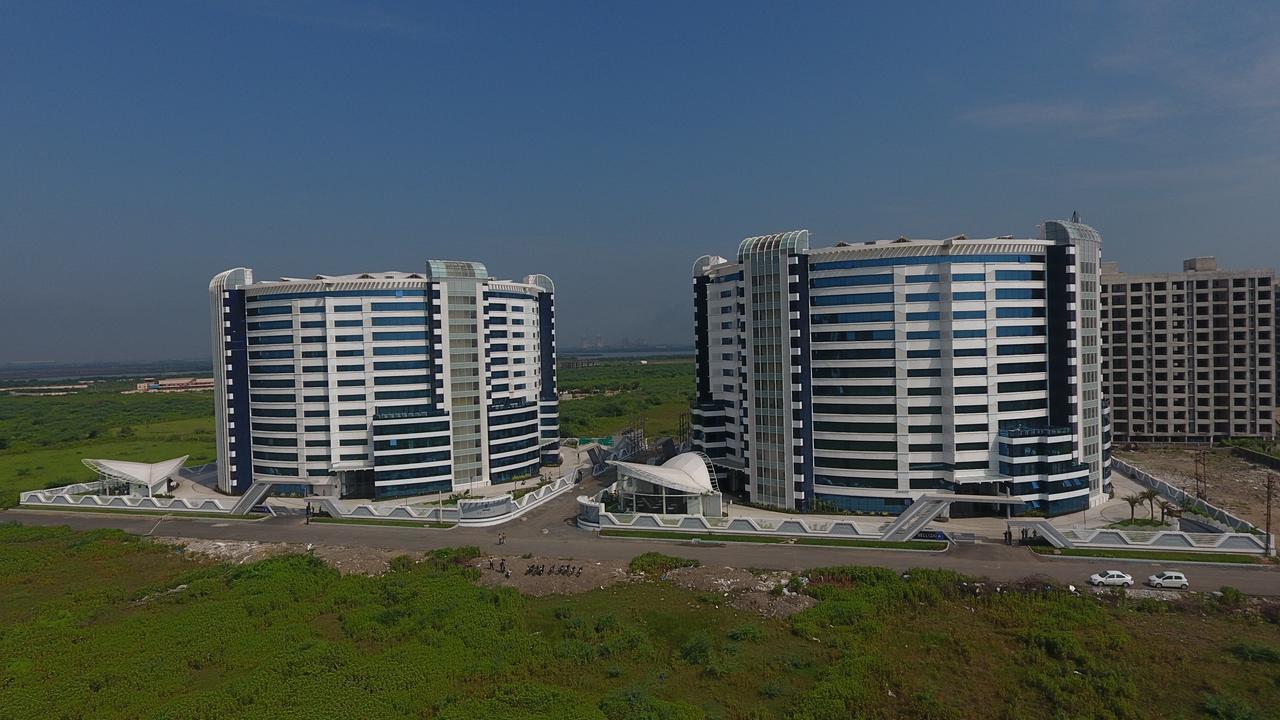 Rajhans Belliza Service Apartment Сурат Экстерьер фото