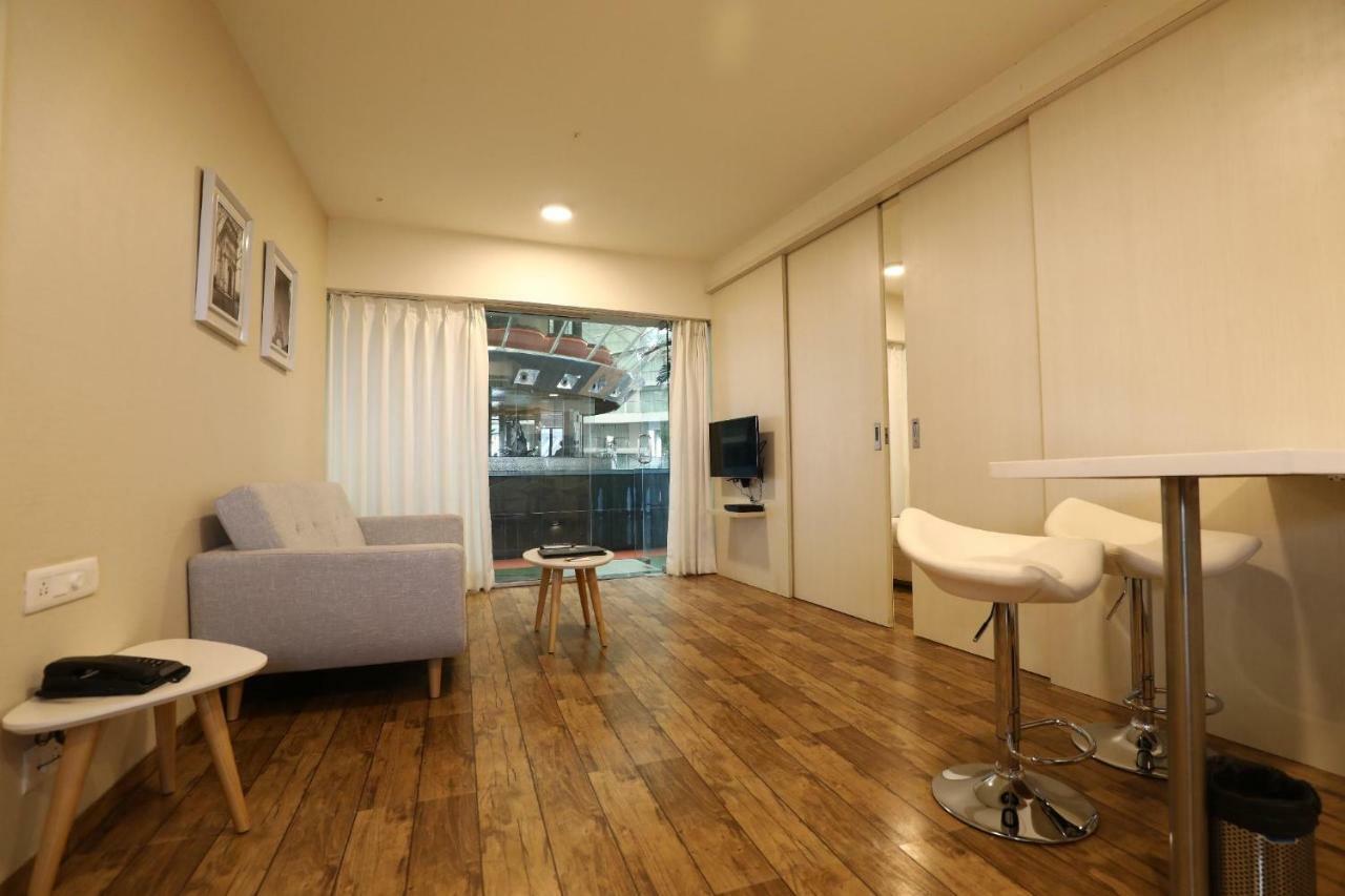 Rajhans Belliza Service Apartment Сурат Экстерьер фото